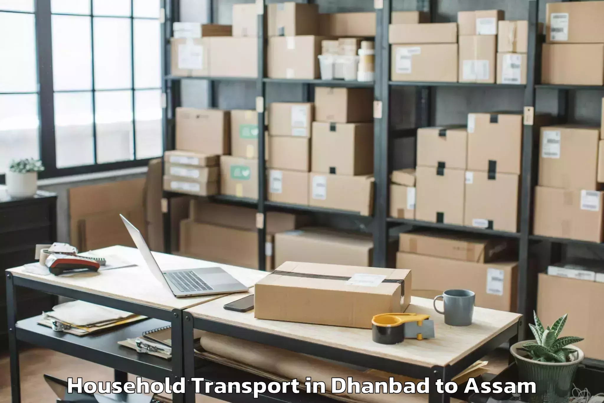 Trusted Dhanbad to Golakganj Household Transport